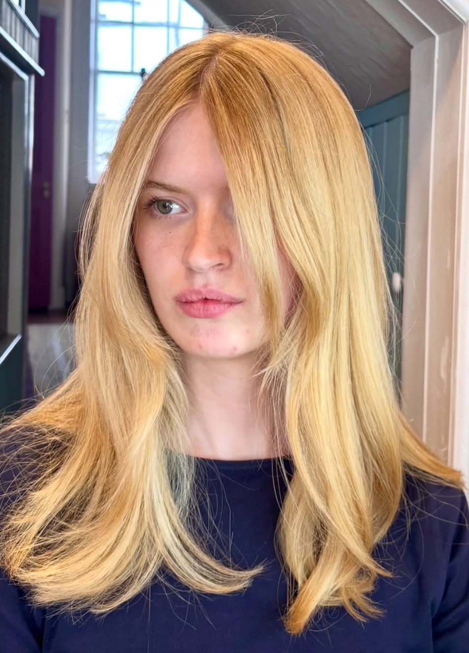 Client with fresh golden blonde colour result